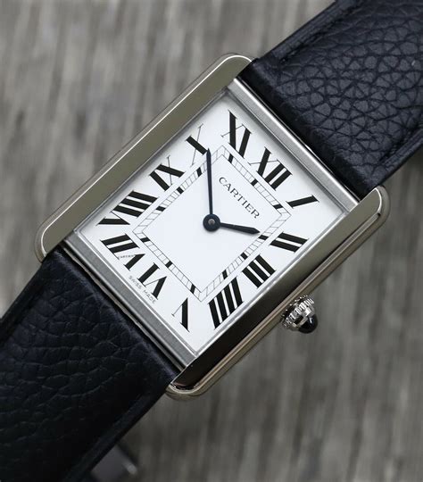 cartier tank quartz argent.